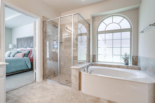 9836 Amaranth Dr, Fort Worth, TX 76177 - ensuite bathroom featuring a garden tub, a shower stall, and plenty of natural light