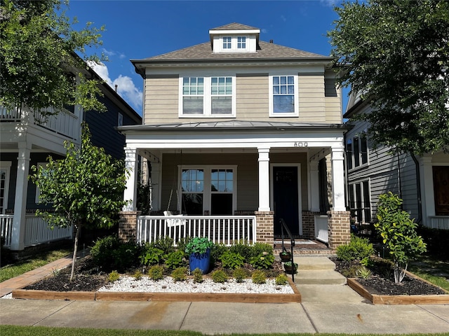 809 Cameron Ct, Coppell, TX 75019 - american foursquare style home with covered porch, a shingled roof, and brick siding