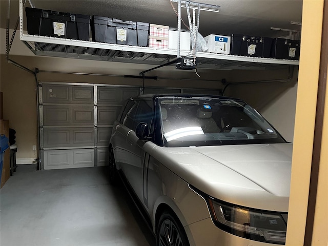 809 Cameron Ct, Coppell, TX 75019 - garage featuring a garage door opener