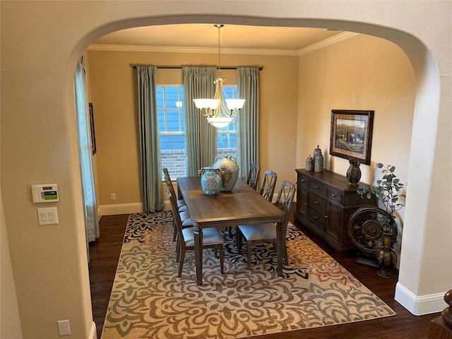 809 Cameron Ct, Coppell, TX 75019 - dining area featuring arched walkways, a chandelier, wood finished floors, ornamental molding, and baseboards