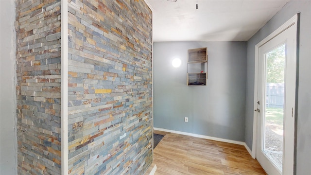 7409 Pebble Beach Dr, Rowlett, TX 75088 - spare room with light wood-type flooring and baseboards