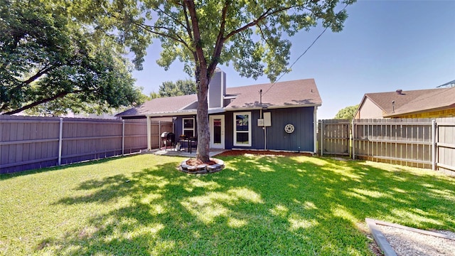 7409 Pebble Beach Dr, Rowlett, TX 75088 - back of property featuring a patio and a shingled roof