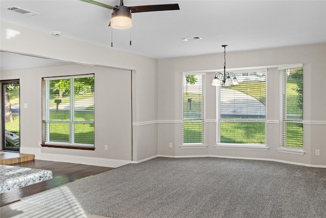 7636 Skylake Dr, Fort Worth, TX 76179 - unfurnished living room with a chandelier, baseboards, and a ceiling fan