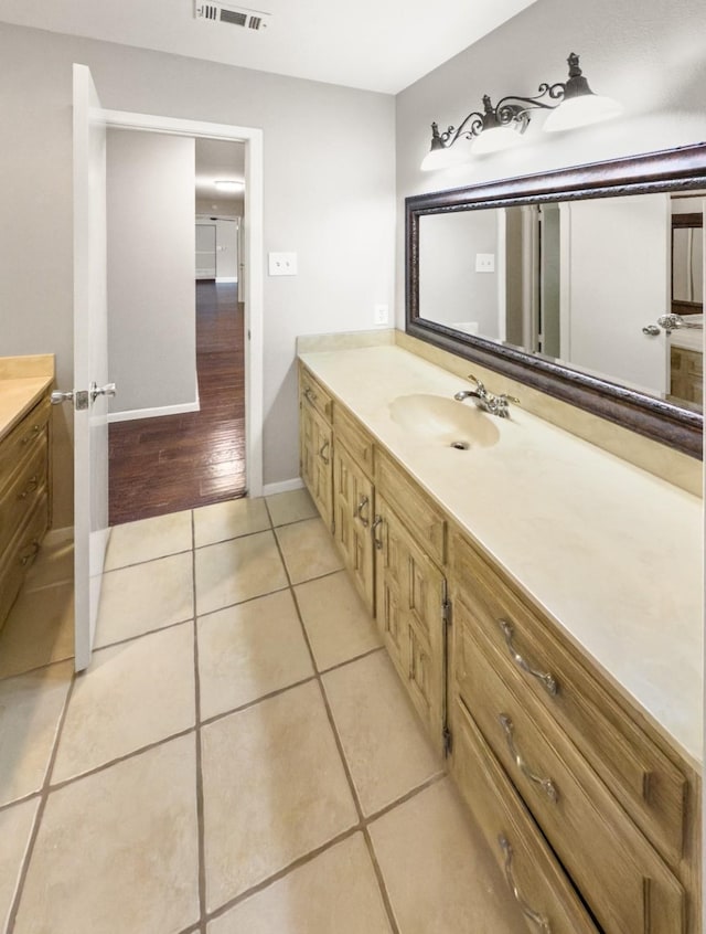 7636 Skylake Dr, Fort Worth, TX 76179 - bathroom with vanity, tile patterned floors, and baseboards