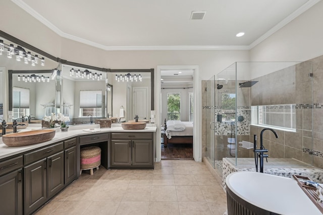 5594 Beacon Hill Dr, Frisco, TX 75036 - bathroom with a shower stall, vanity, a garden tub, tile patterned flooring, and ornamental molding