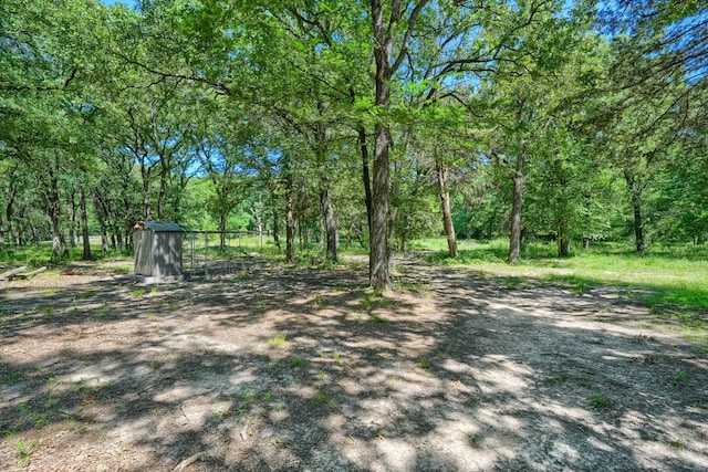 9613 County Road 4091, Scurry, TX 75158 - view of yard with an outdoor structure