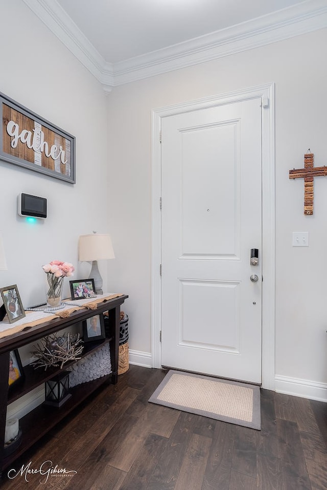 606 Labarre Ln, Bossier City, LA 71111 - entrance foyer featuring crown molding, dark wood finished floors, and baseboards