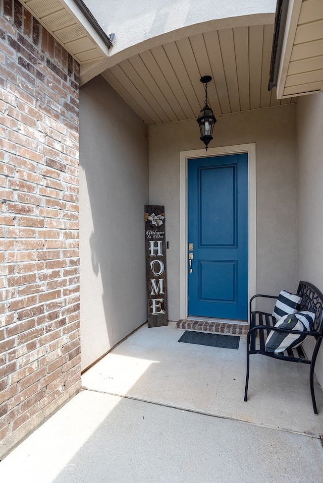 606 Labarre Ln, Bossier City, LA 71111 - entrance to property with stucco siding and brick siding