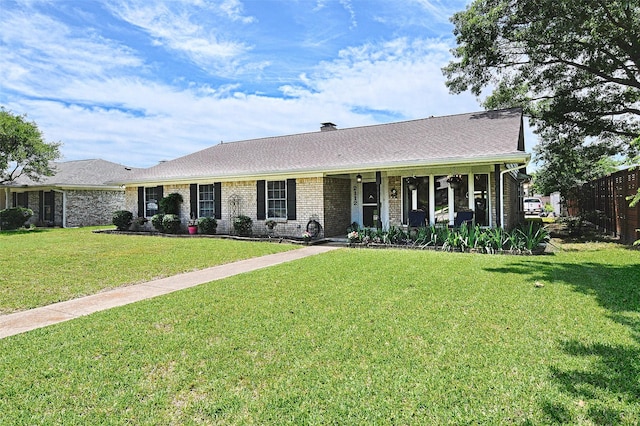 2112 Columbia Dr, Richardson, TX 75081 - ranch-style home with brick siding and covered porch