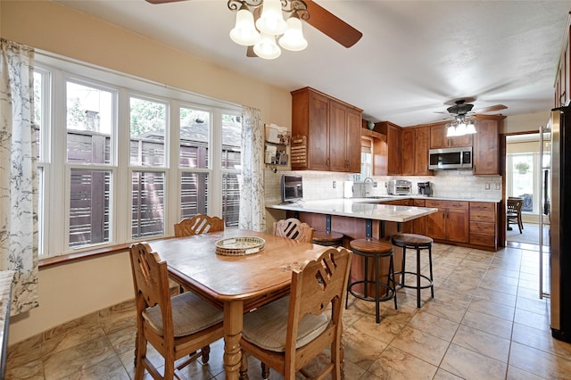 2112 Columbia Dr, Richardson, TX 75081 - dining room with a ceiling fan