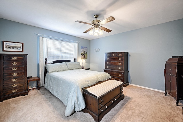 2112 Columbia Dr, Richardson, TX 75081 - bedroom featuring light carpet, baseboards, and a ceiling fan