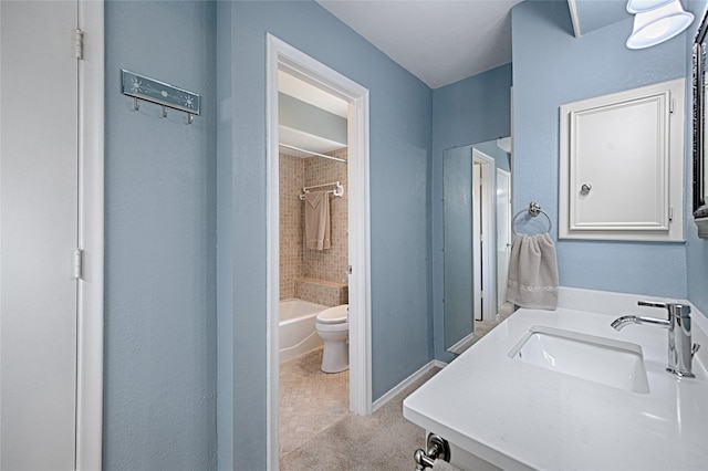 2112 Columbia Dr, Richardson, TX 75081 - full bath featuring toilet, vanity, tub / shower combination, and baseboards