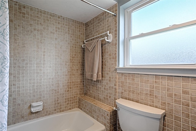 2112 Columbia Dr, Richardson, TX 75081 - bathroom with shower / bathtub combination with curtain, plenty of natural light, tile walls, and toilet