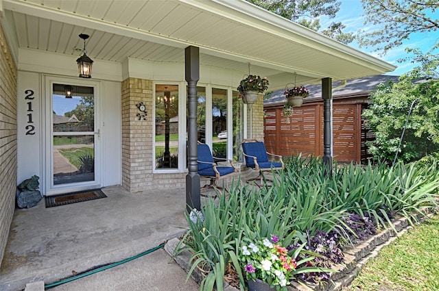 2112 Columbia Dr, Richardson, TX 75081 - view of exterior entry with brick siding and covered porch