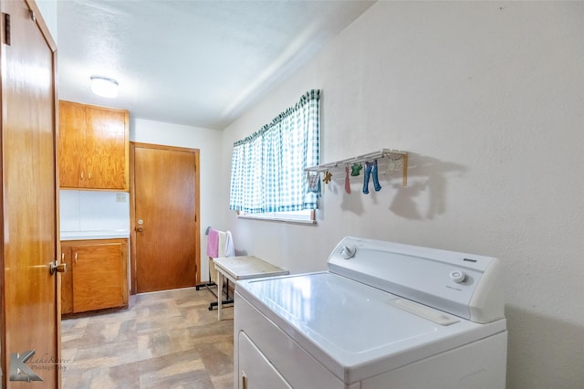 2757 Old Anson Rd, Abilene, TX 79603 - laundry area featuring light flooring and separate washer and dryer