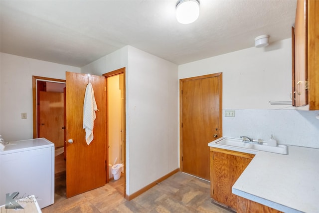 2757 Old Anson Rd, Abilene, TX 79603 - laundry area with washer / clothes dryer and baseboards