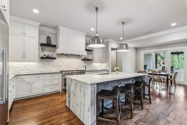 2509 Oak Bend Ct, Southlake, TX 76092 - kitchen featuring open shelves, premium appliances, ornamental molding, white cabinets, and decorative backsplash