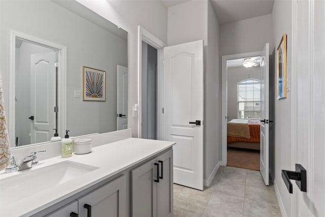 2529 Solomons Pl, Wylie, TX 75098 - bathroom with vanity, ceiling fan, ensuite bath, tile patterned flooring, and baseboards