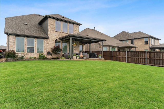 2529 Solomons Pl, Wylie, TX 75098 - rear view of property featuring brick siding, a patio area, and a shingled roof
