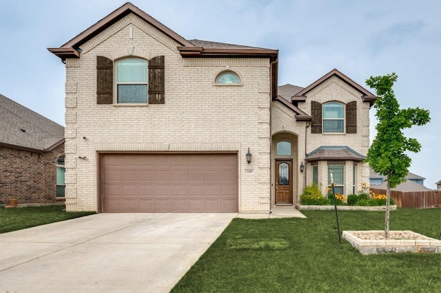 249 Noble Nest Dr, Midlothian, TX 76065 - french country inspired facade featuring brick siding, a garage, a front yard, and concrete driveway