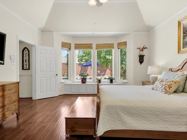 2525 Still Springs Dr, Little Elm, TX 75068 - bedroom with lofted ceiling, dark wood-style flooring, and crown molding