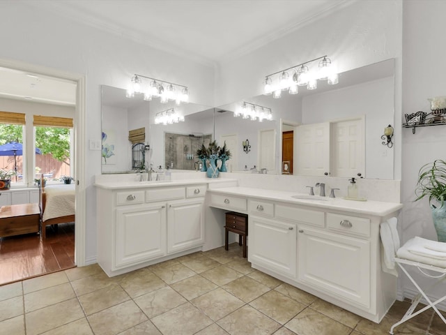 2525 Still Springs Dr, Little Elm, TX 75068 - full bath featuring double vanity, crown molding, tile patterned flooring, and ensuite bath