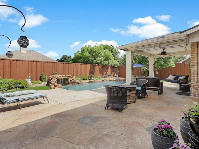 2525 Still Springs Dr, Little Elm, TX 75068 - fenced backyard featuring ceiling fan, a patio area, and an outdoor living space