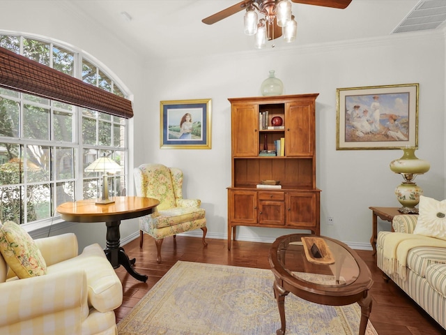 2525 Still Springs Dr, Little Elm, TX 75068 - sitting room featuring a ceiling fan, baseboards, dark wood-style flooring, and crown molding