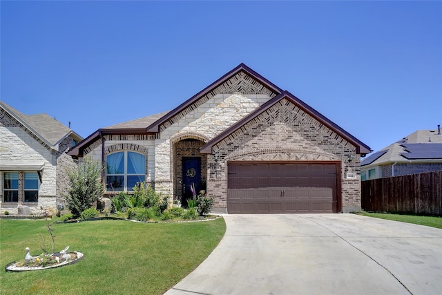 444 Oliver Ct, Argyle, TX 76226 - french provincial home with brick siding, concrete driveway, and an attached garage