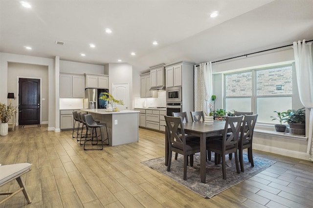 444 Oliver Ct, Argyle, TX 76226 - dining area featuring light wood-style flooring, recessed lighting, and baseboards