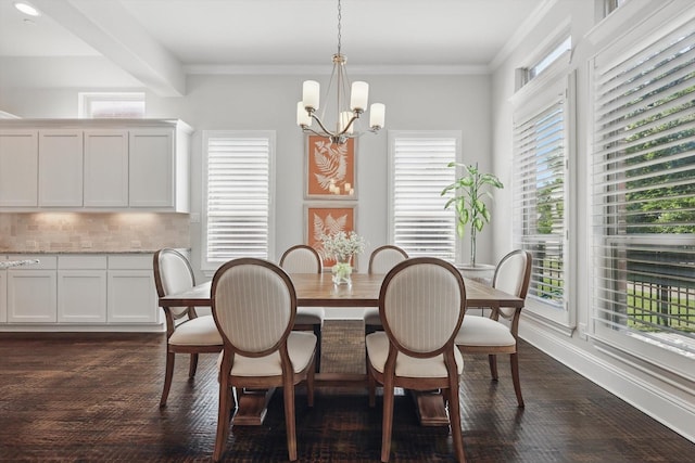 2812 Cedar Elm Dr, Carrollton, TX 75010 - dining area featuring a chandelier, dark wood-style flooring, and crown molding