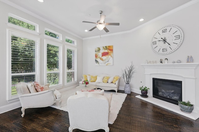 2812 Cedar Elm Dr, Carrollton, TX 75010 - living area featuring crown molding, a ceiling fan, recessed lighting, a glass covered fireplace, and baseboards