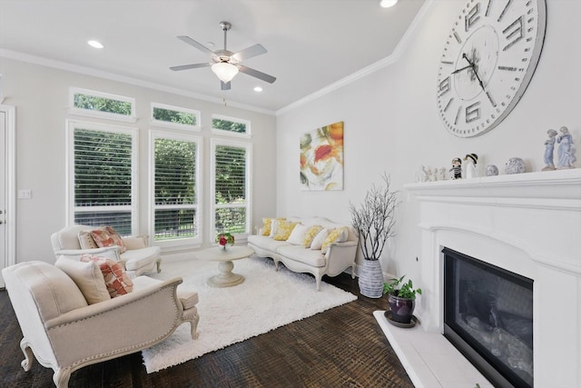 2812 Cedar Elm Dr, Carrollton, TX 75010 - living area with a ceiling fan, a glass covered fireplace, crown molding, recessed lighting, and baseboards
