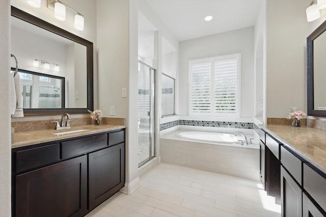 2812 Cedar Elm Dr, Carrollton, TX 75010 - bathroom with plenty of natural light, vanity, and a stall shower