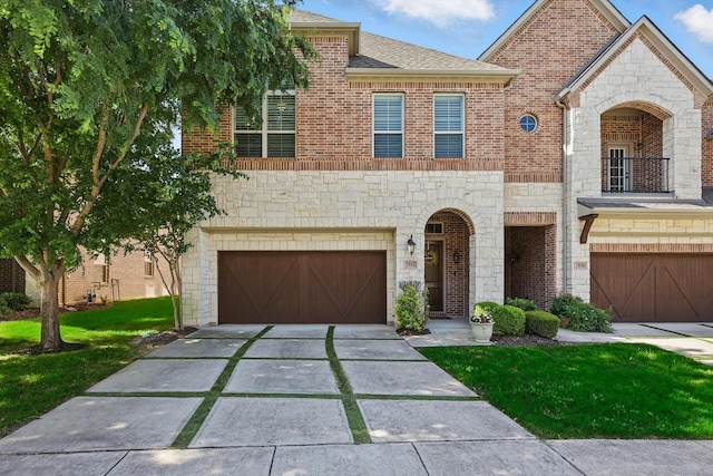 2812 Cedar Elm Dr, Carrollton, TX 75010 - view of front of home with an attached garage, stone siding, driveway, and a balcony