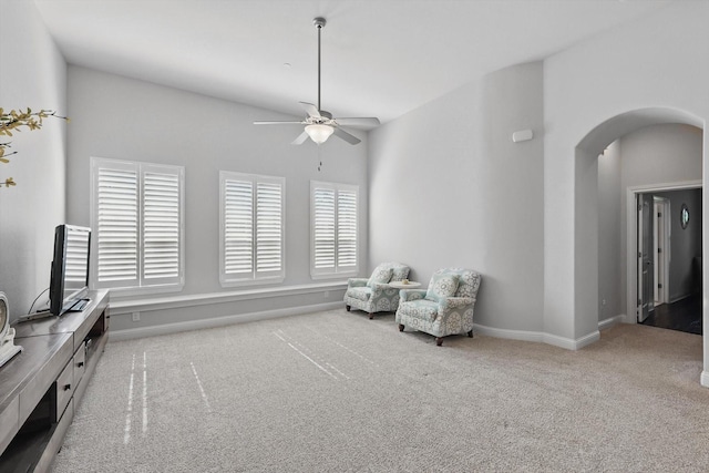 2812 Cedar Elm Dr, Carrollton, TX 75010 - unfurnished room with carpet floors, ceiling fan, arched walkways, and baseboards