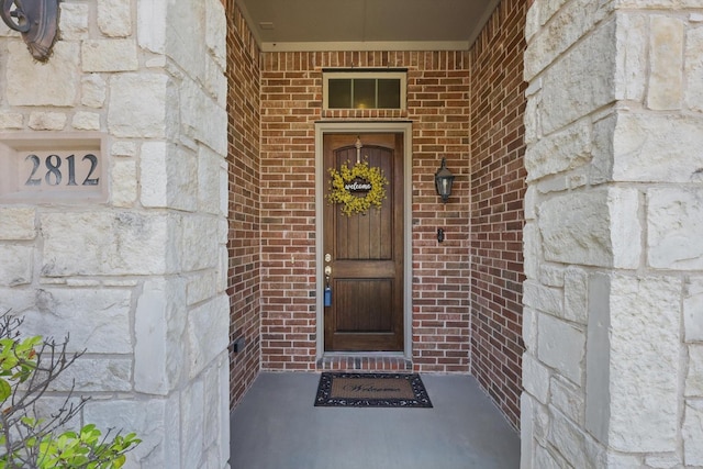 2812 Cedar Elm Dr, Carrollton, TX 75010 - property entrance featuring stone siding and brick siding