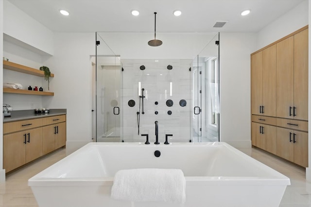 5913 Preston Way, Colleyville, TX 76034 - bathroom featuring a stall shower, a freestanding bath, recessed lighting, and vanity