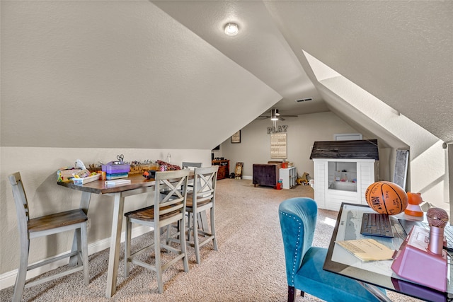 125 Wood Bend Ct, Weatherford, TX 76087 - carpeted dining area featuring lofted ceiling, baseboards, and a textured ceiling