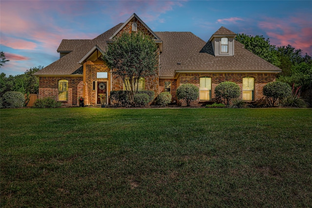 125 Wood Bend Ct, Weatherford, TX 76087 - view of front facade featuring a lawn, a shingled roof, and brick siding