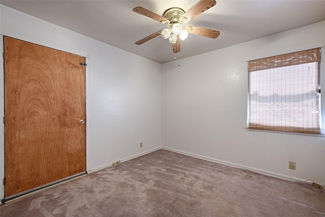 1705 Savoy St, Dallas, TX 75224 - empty room featuring carpet, ceiling fan, and baseboards