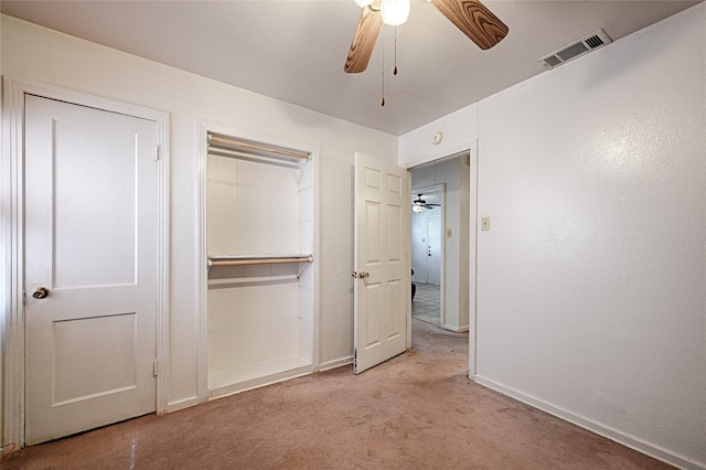 1705 Savoy St, Dallas, TX 75224 - unfurnished bedroom with light colored carpet, baseboards, a closet, and a ceiling fan