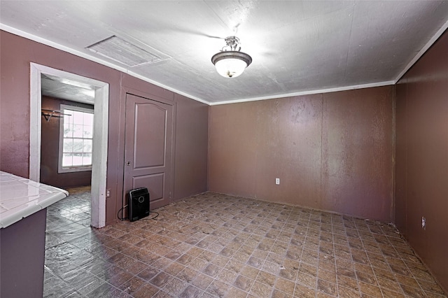 1705 Savoy St, Dallas, TX 75224 - unfurnished dining area with wooden walls