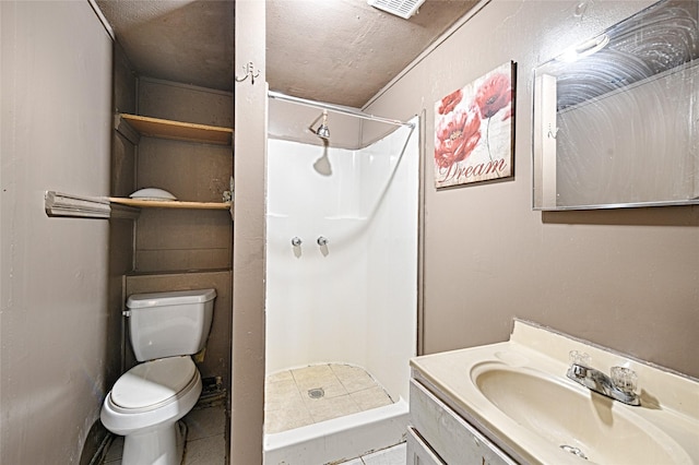1705 Savoy St, Dallas, TX 75224 - bathroom featuring toilet, tile patterned floors, a shower stall, and vanity