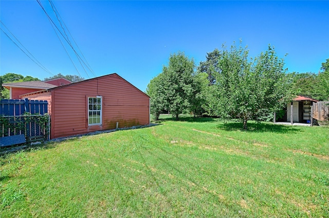 1705 Savoy St, Dallas, TX 75224 - view of yard featuring an outbuilding