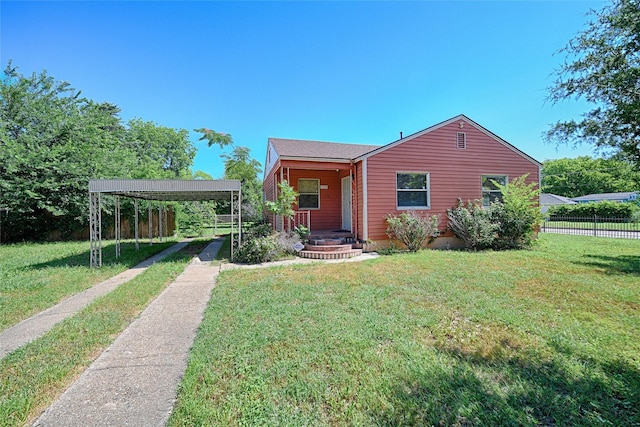 1705 Savoy St, Dallas, TX 75224 - view of front of home featuring a detached carport and driveway