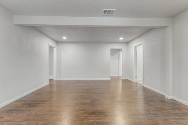 3321 NW 31st St, Fort Worth, TX 76106 - empty room with dark wood-type flooring, recessed lighting, and baseboards