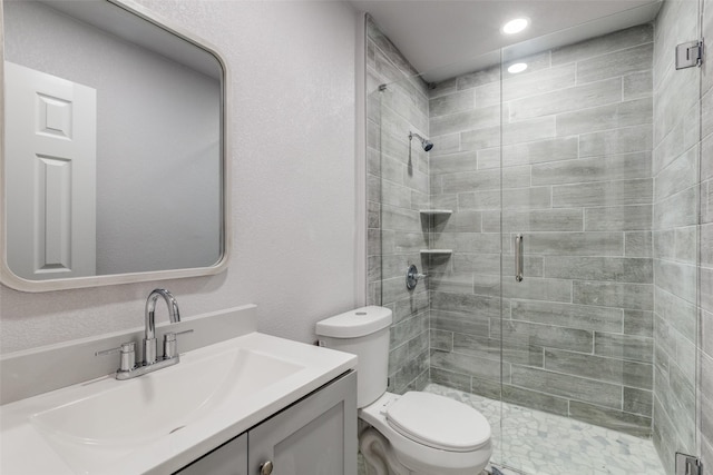 3321 NW 31st St, Fort Worth, TX 76106 - full bathroom with vanity, a shower stall, toilet, and recessed lighting
