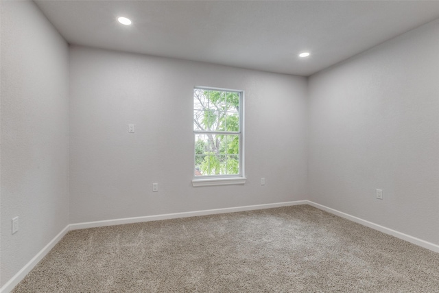 3321 NW 31st St, Fort Worth, TX 76106 - carpeted spare room with baseboards and recessed lighting