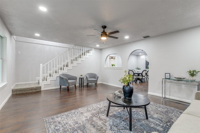 3321 NW 31st St, Fort Worth, TX 76106 - living area featuring stairway, a ceiling fan, wood finished floors, recessed lighting, and arched walkways